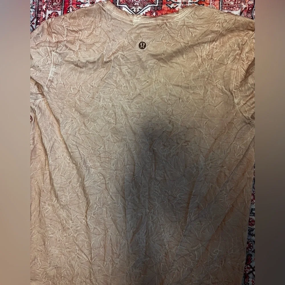 Lululemon short sleeve marble top size 4 excellent condition tech swiftly soft